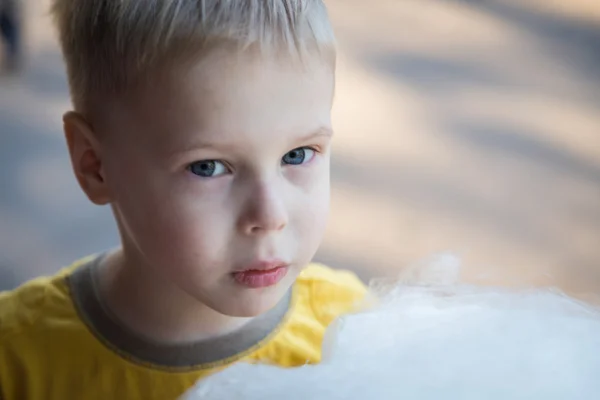 stock image Little cute boy with cotton candy