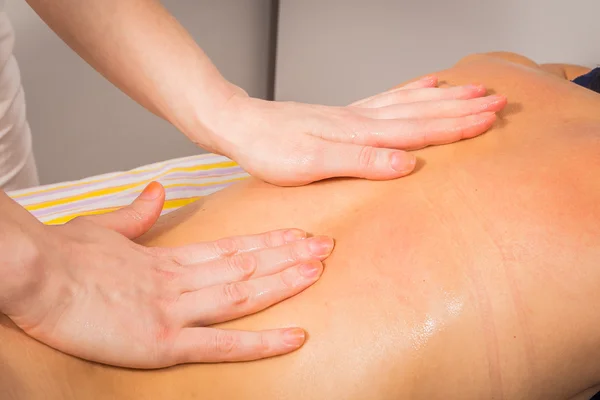 Woman relaxing with hand massage — Stock Photo, Image