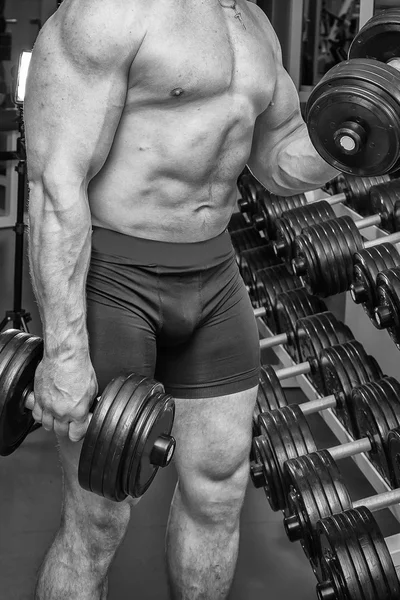 Strong man training in gym — Stock Photo, Image