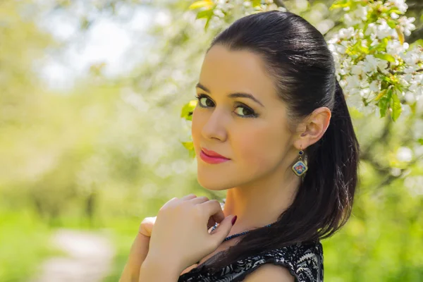 Woman on spring background — Stock Photo, Image