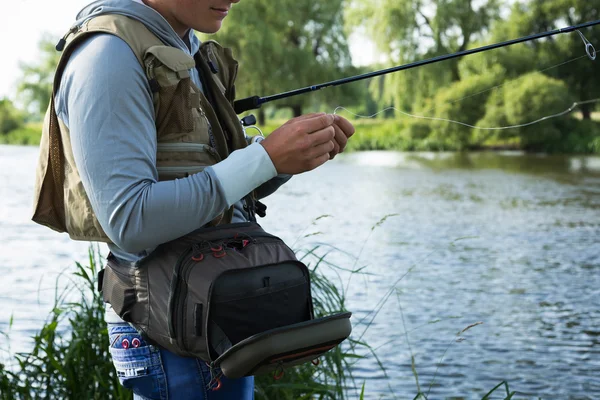 Fisherman on the river bank. — Stock Photo, Image