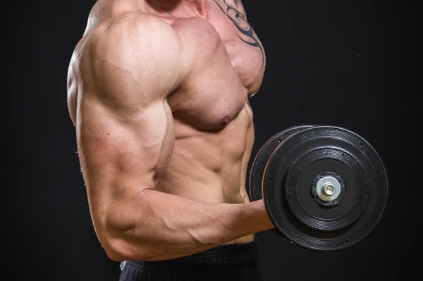 Man bedrijf halter — Stockfoto