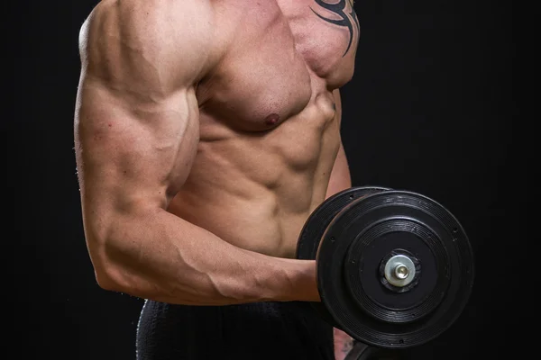 Man bedrijf halter — Stockfoto