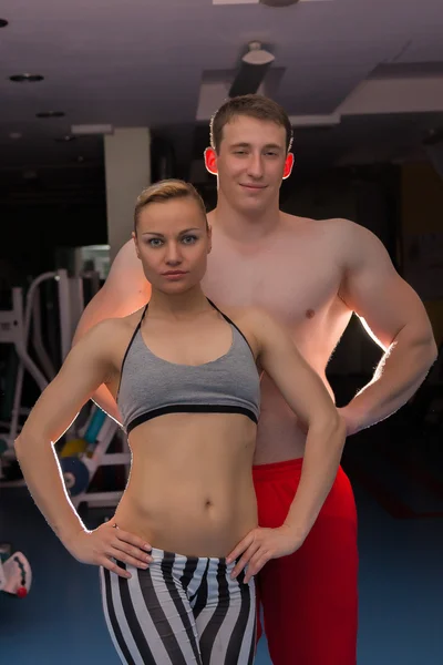 Sporty man and woman — Stock Photo, Image