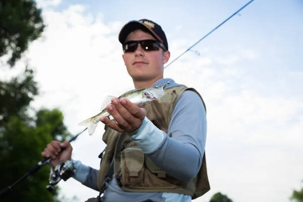 Fisherman on the river bank — Stock Photo, Image