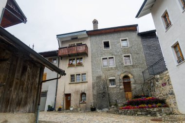 The beautiful and picturesque town of Gruyeres in Switzerland. Architecture and landscapes