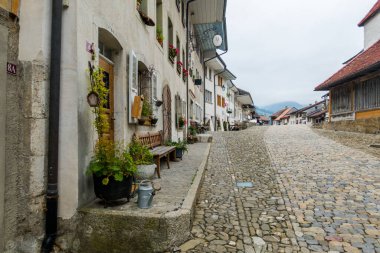 The beautiful and picturesque town of Gruyeres in Switzerland. Architecture and landscapes