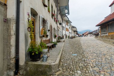 The beautiful and picturesque town of Gruyeres in Switzerland. Architecture and landscapes