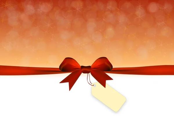 Shiny golden and red background with red bow with tag — Stock Photo, Image