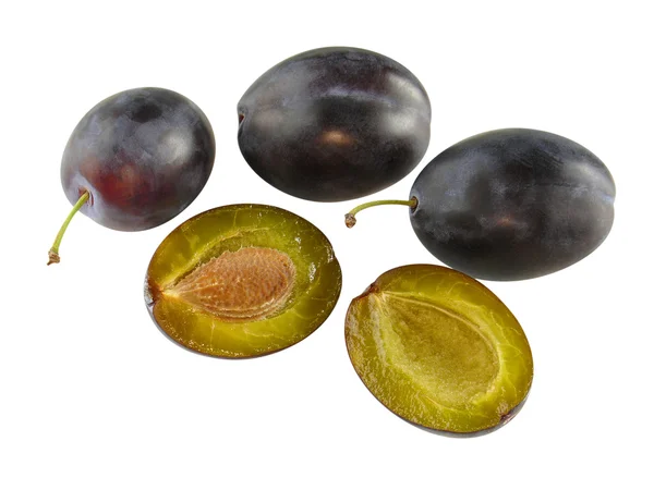 4 fresh plums - one cut with stone - optional — Stock Photo, Image