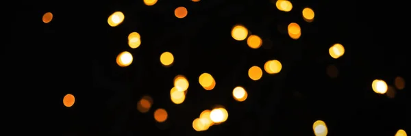 Abstracte Bokeh Oranje Glitter Schitteren Voor Kerst Nieuwjaarsavond Feest Zwarte — Stockfoto