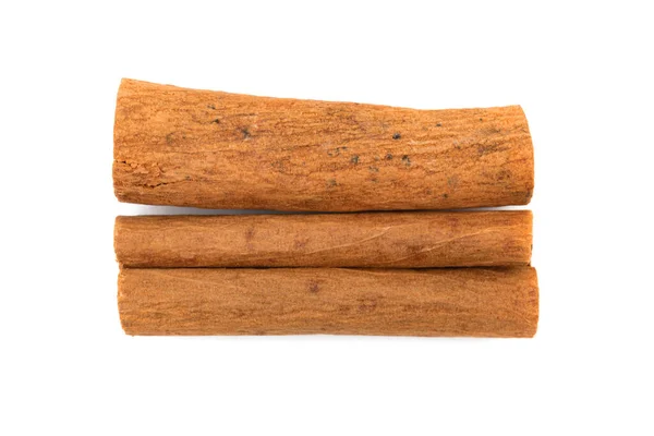 Cinnamon sticks close-up, isolated on a white background photo — Stock Photo, Image