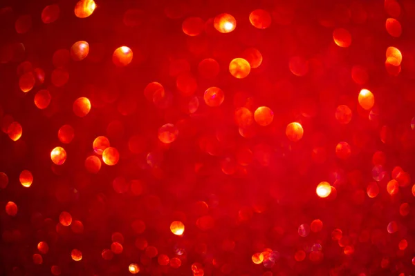 Röd bokeh bakgrund. Vintage glitter ljus, glödande jul effekter bakgrund foto — Stockfoto