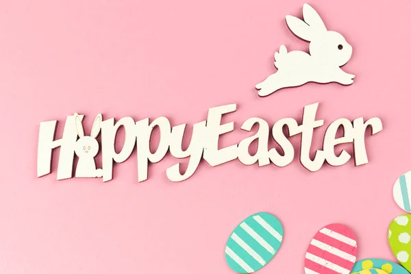 Szczęśliwy Wielkanoc Wiosna Wakacje Kartka Życzeniami Kolorowe Pisanki Jasnoróżowym Tle — Zdjęcie stockowe