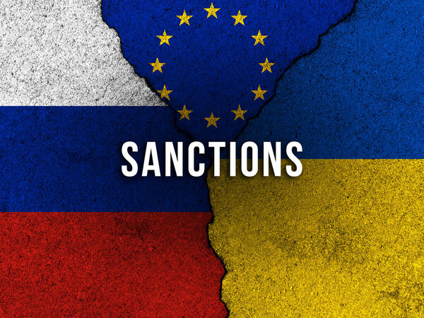 European union sanctions against Russia. Bloody crime against civilians in Ukraine concept background with flags image