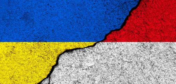 乌克兰和摩纳哥的国旗 支助和帮助 武器和军事装备 伙伴关系和外交 人道主义援助和对乌克兰难民的捐助概念 — 图库照片