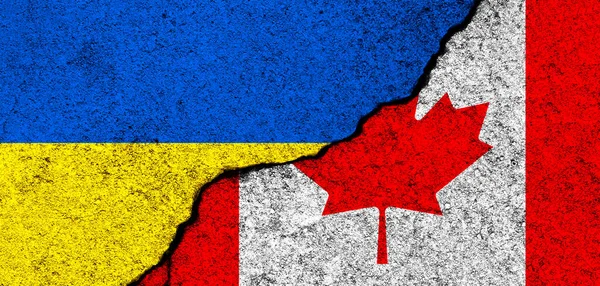 乌克兰和加拿大的国旗 支助和帮助 武器和军事装备 伙伴关系和外交 人道主义援助和对乌克兰难民的捐赠 — 图库照片