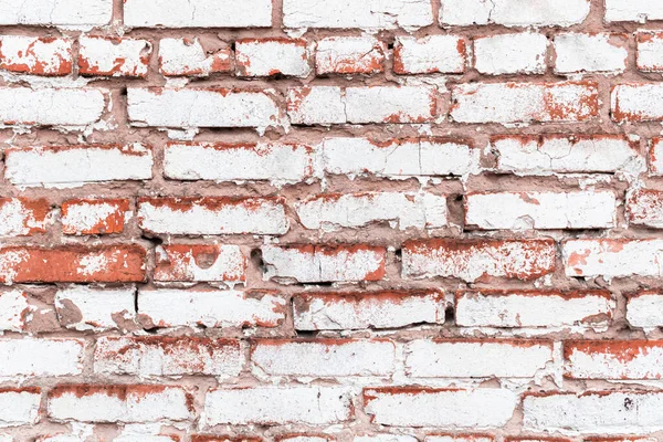Yıpranmış boyalı beyaz tuğla duvar, yüksek detaylı doku arka planı.