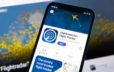 Poltava, Ukraine - April 28, 2022: Flight Radar 24 application icon close-up view of mobile phone screen. Flight Tracker app photo