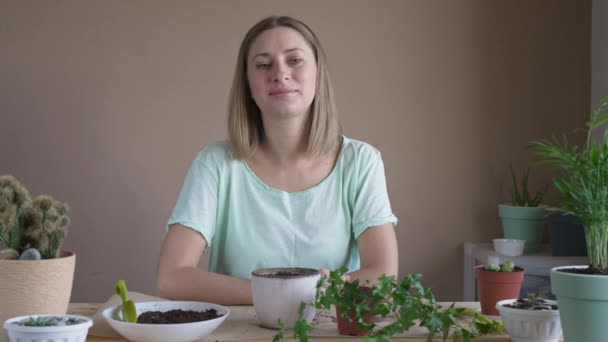 Portrait Smiling Girl Planting Flower Pot Woman Transplanting Indoor Plants — Stockvideo