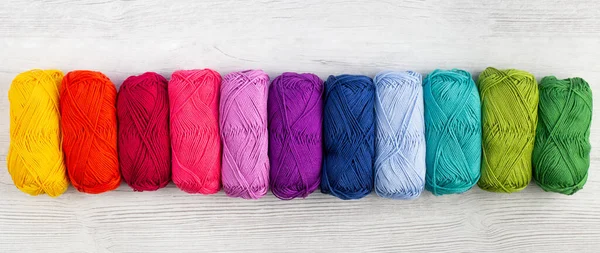 Rainbow Colored Skeins Yarn Laid Row Light Background — ストック写真