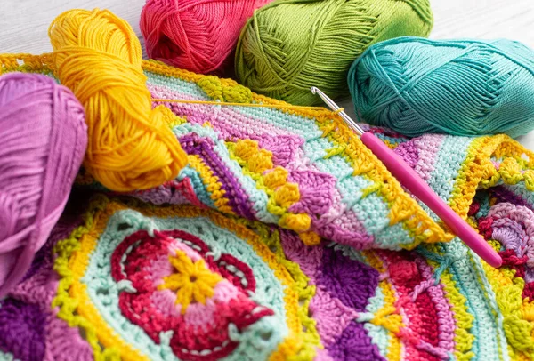 Colorful Skeins Yarn Arranged Next Crocheted Blanket — ストック写真