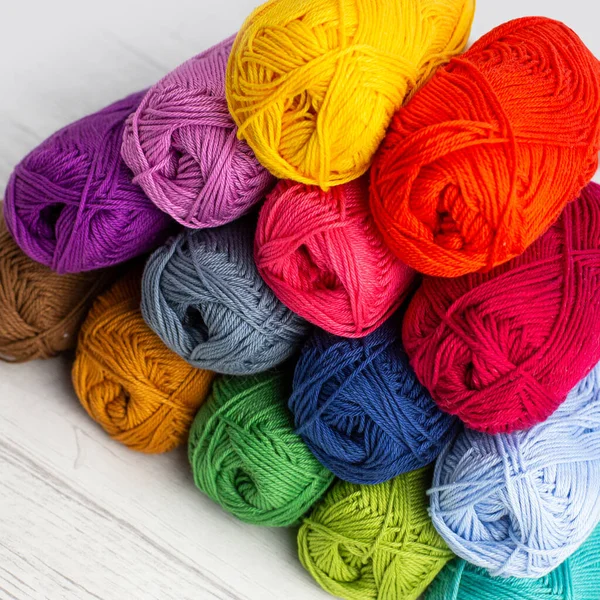 Rainbow Colored Skeins Yarn Stacked Pyramid Light Background — ストック写真