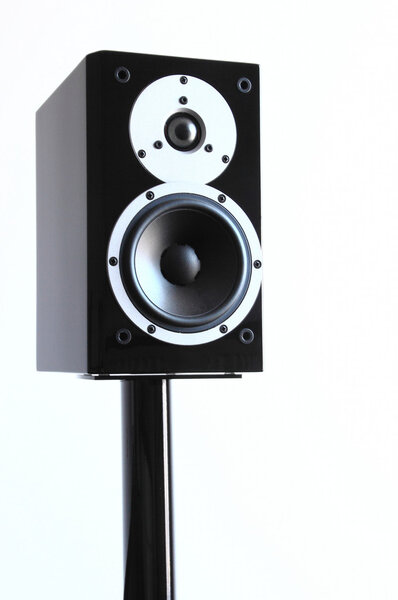 Black glossy audio speakers on black stand isolated on white background