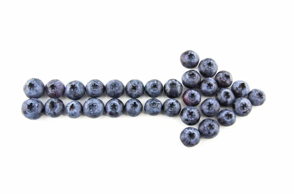 Arrow made of blueberries — Stock Photo, Image