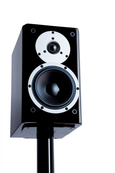 Black audio speakers on black stand isolated on white background