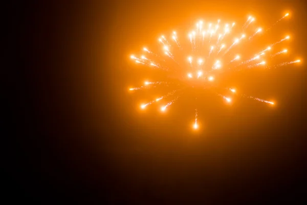 Fuochi d'artificio d'oro sfondo astratto — Foto Stock