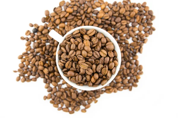 Cup filled with coffee beans — Stock Photo, Image