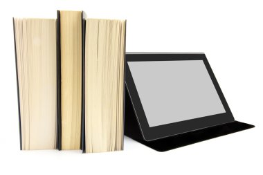 kitap ve bir tablet cihaz