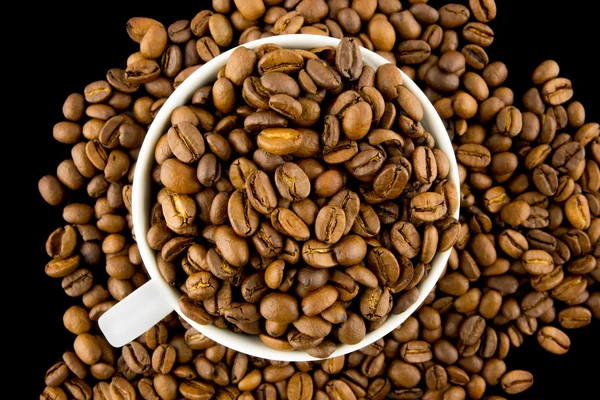 Aerial view of a cup filled with coffee beans — Stock Photo, Image