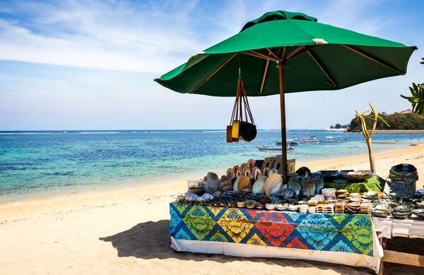 Traditional souvenirs on balinese beach in Indonesia