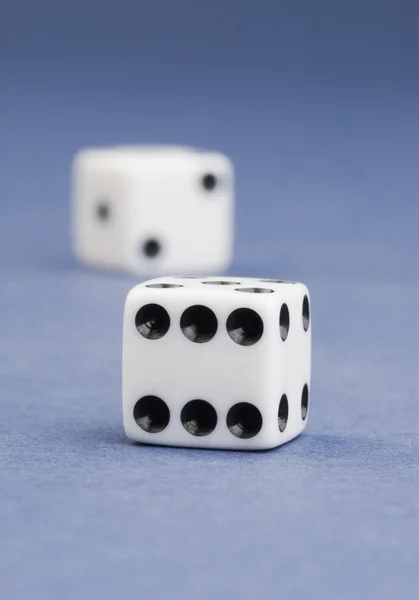 Two dices on blue background — Stock Photo, Image