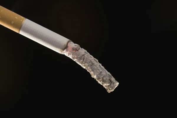 Close-up of a cigarette with ash — Stock Photo, Image