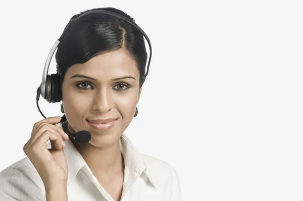 Female customer service representative smiling — Stock Photo, Image