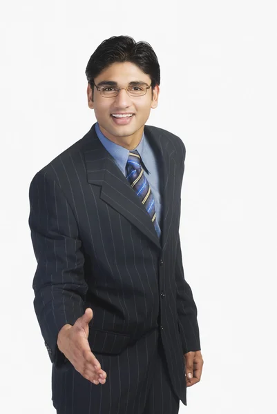 Businessman offering a handshake — Stock Photo, Image