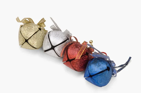 Cztery kolorowe Dzwonki Boże Narodzenie — Zdjęcie stockowe