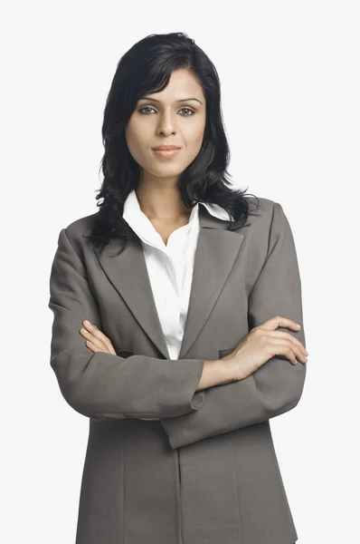 Portrait of a businesswoman smirking — Stock Photo, Image