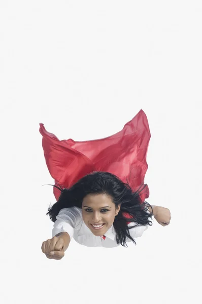 Portrait of a woman imitating as a superhero — Stock Photo, Image