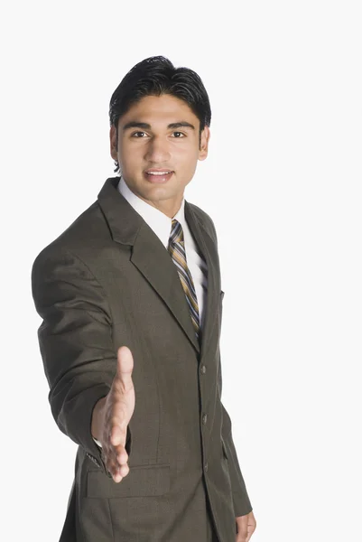 Businessman offering a handshake — Stok fotoğraf