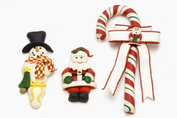 Cana de doces, Papai Noel e boneco de neve — Fotografia de Stock
