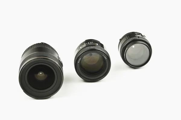 Close-up of three photographic lenses — Stock Photo, Image