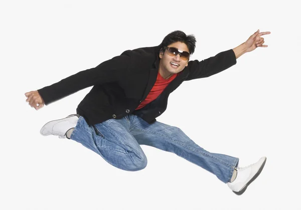 Man jumping in mid-air — Stock Photo, Image