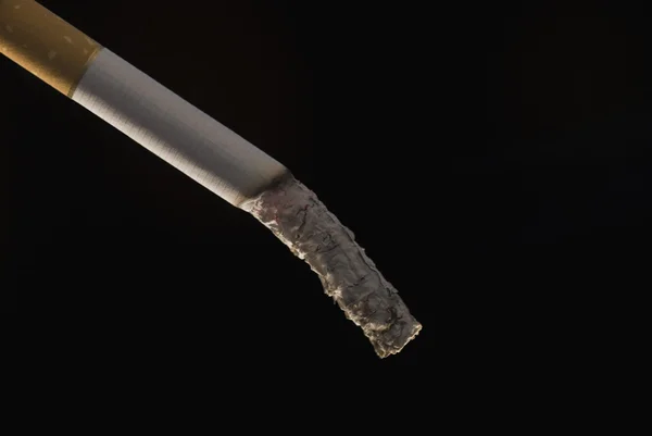 Close-up of a cigarette with ash — Stock Photo, Image