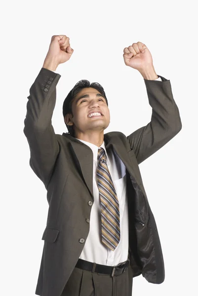 Empresário apertando punhos em excitação — Fotografia de Stock