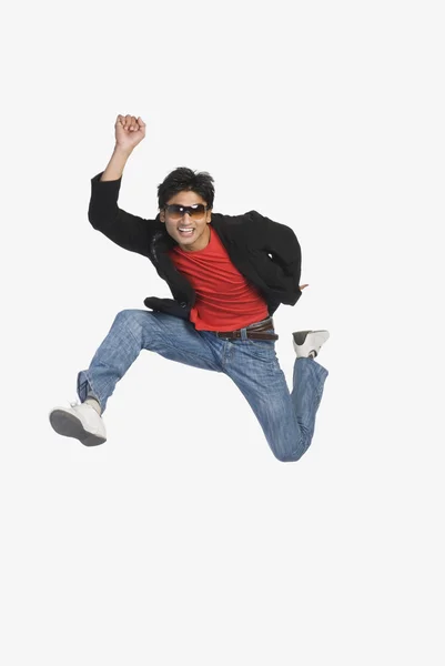 Man jumping in mid-air — Stok fotoğraf