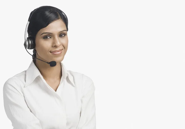 Portrait of a female customer service representative smiling — Stock Photo, Image